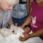 The mother and nurse work and pray. The mother and nurse work and pray.
